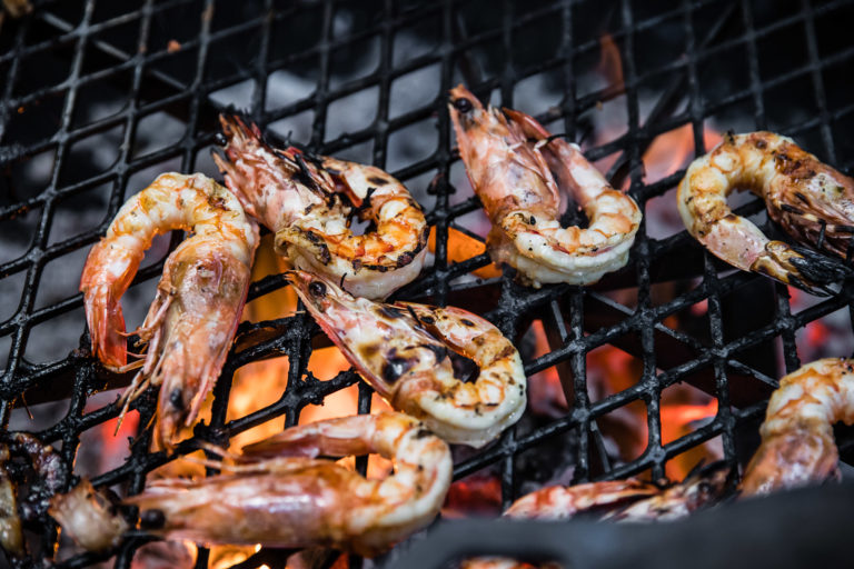 Flame-grilled prawns on the Pinetrees BBQ, Lord Howe Island
