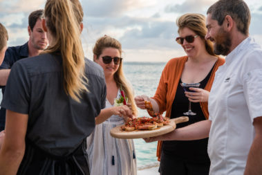 Canapes and cocktails on the boatshed deck, Lord Howe Island