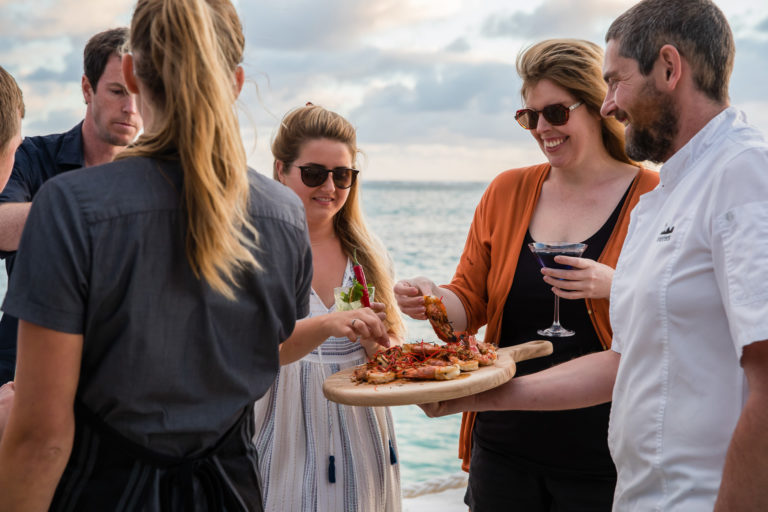Canapes and cocktails on the boatshed deck, Lord Howe Island