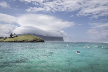 A lifeguard watches swimmers in the Lord Howe Lagoon
