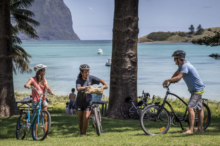 Bike riders near the pontoon, Lord Howe Island