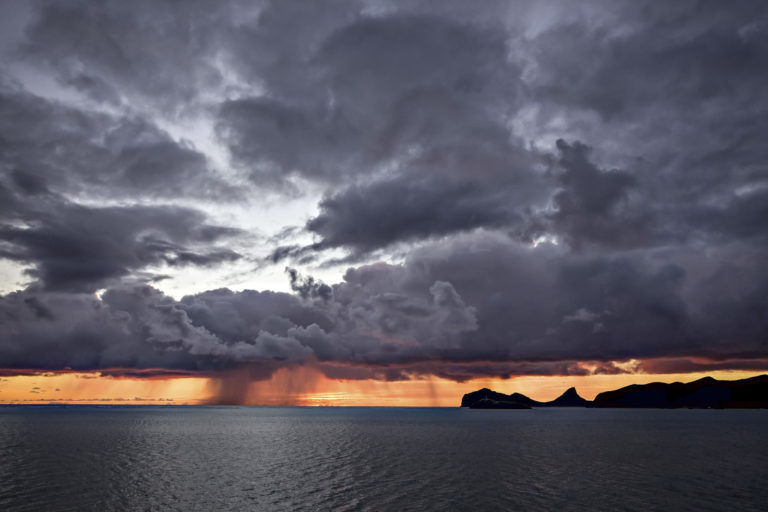 Passing shower near North Head, Lord Howe Island