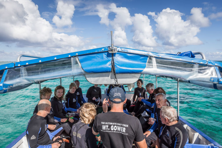 A safety briefing before snorkelling at Commets Hole, Lord Howe Island