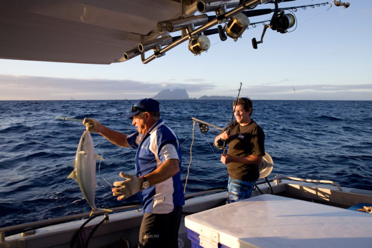 There are lots of helpers to get kingfish for dinner, Lord Howe Island