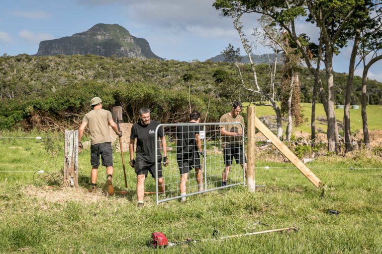 Al and the boys hanging a new gate